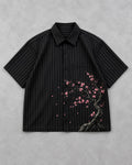 VELOR Blossom Pinstripe Boxy Shirt in black with fine pinstripes and pink blossom artwork, front view