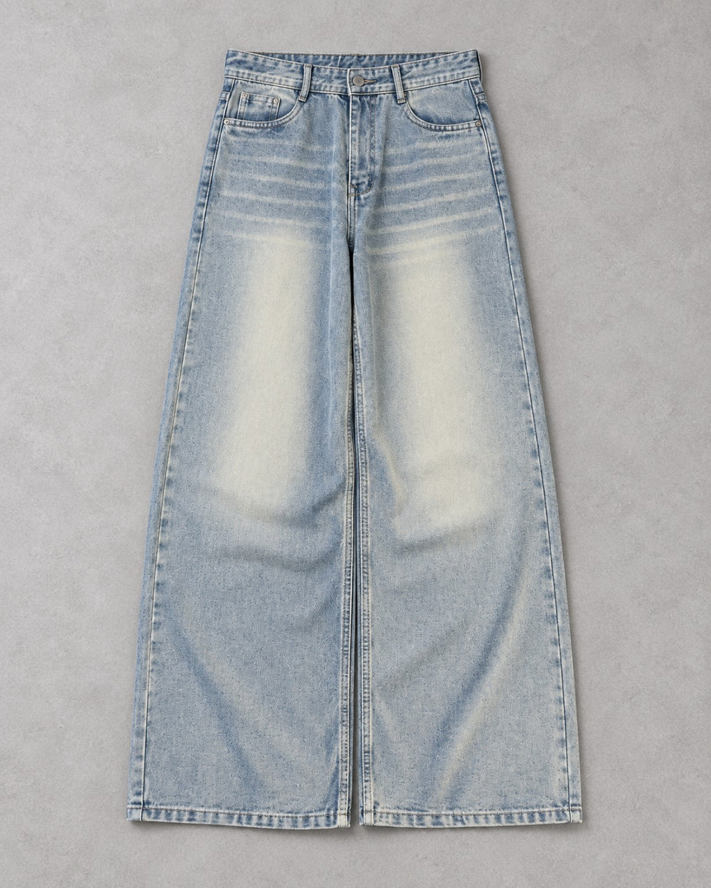 VELOR Faded Blue Wide-Leg Jeans showing the light blue fade, front pockets and wide stitched hems